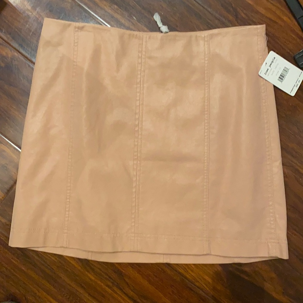 Free people faux leather mini skirt New With Tags in a pretty blush color